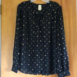 Black and gold blouse.